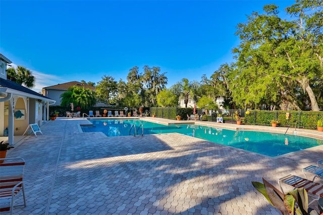5717 Fishhawk Ridge Dr, Lithia, FL 33547 - community pool featuring a patio