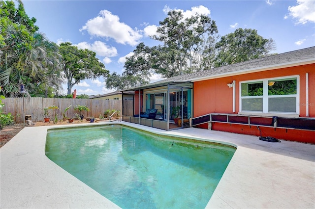 6865 Circle Creek Dr, Pinellas Park, FL 33781 - view of swimming pool with a sunroom and a patio