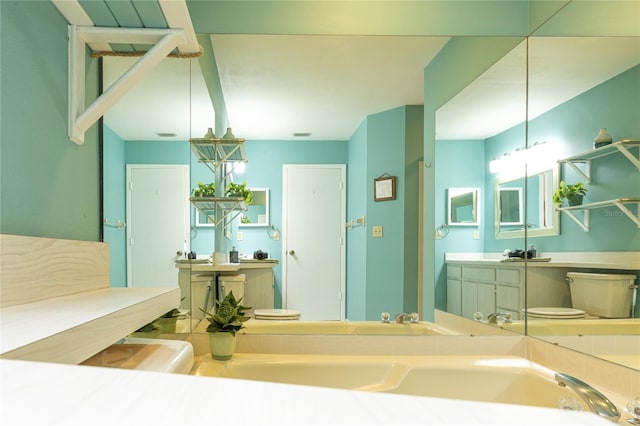112 Sun Isle Cir Unit 112, Treasure Island, FL 33706 - bathroom with a garden tub and vanity