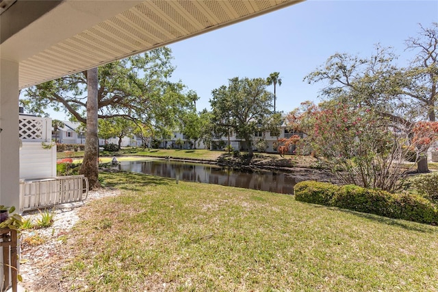 112 Sun Isle Cir Unit 112, Treasure Island, FL 33706 - view of green lawn with a water view