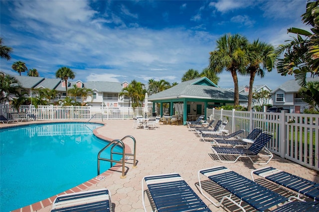 112 Sun Isle Cir Unit 112, Treasure Island, FL 33706 - community pool featuring a patio
