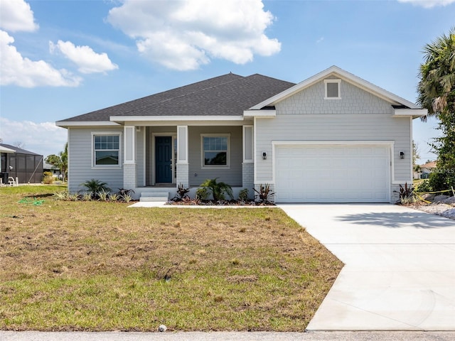 115 White Marsh Ln, Rotonda West, FL 33947 - craftsman inspired home featuring a garage, a front yard, and driveway
