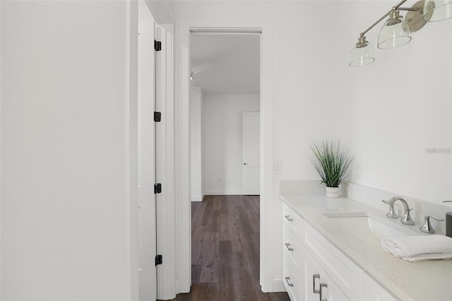 115 White Marsh Ln, Rotonda West, FL 33947 - bathroom featuring vanity and wood finished floors