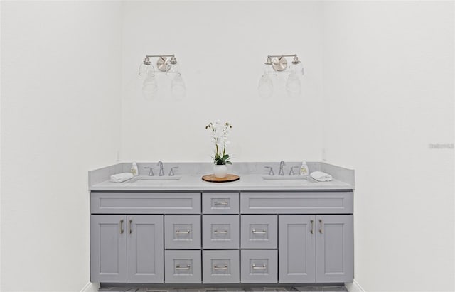 115 White Marsh Ln, Rotonda West, FL 33947 - full bath with baseboards and double vanity
