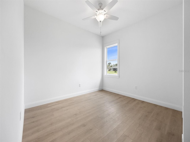 115 White Marsh Ln, Rotonda West, FL 33947 - unfurnished room featuring light wood-type flooring and ceiling fan