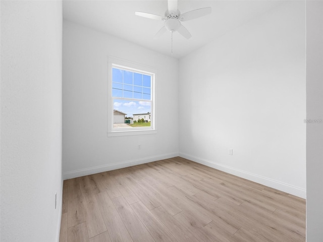 115 White Marsh Ln, Rotonda West, FL 33947 - spare room with light wood finished floors and a ceiling fan