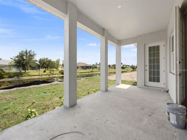 115 White Marsh Ln, Rotonda West, FL 33947 - view of patio featuring a water view