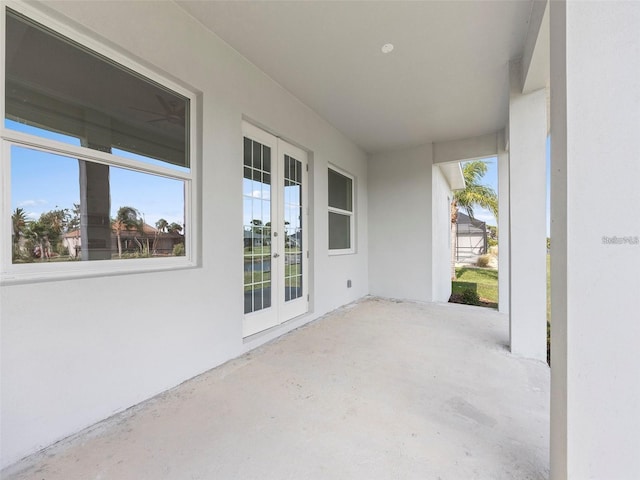 115 White Marsh Ln, Rotonda West, FL 33947 - view of patio featuring french doors