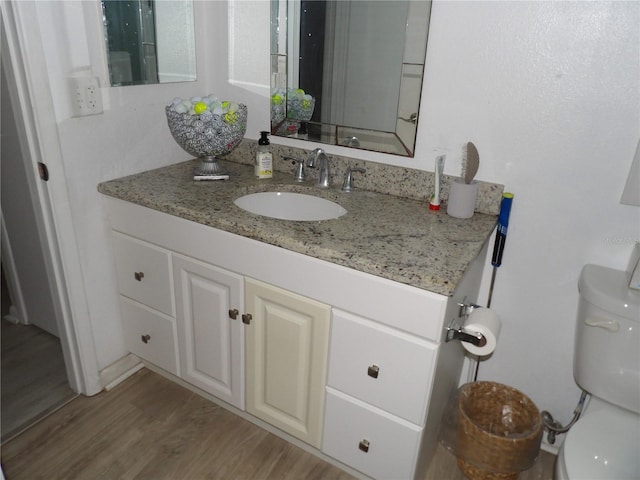 2617 Cove Cay Dr Unit 707, Clearwater, FL 33760 - bathroom featuring vanity and wood finished floors