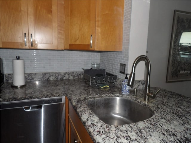 2617 Cove Cay Dr Unit 707, Clearwater, FL 33760 - kitchen with dishwasher, stone counters, decorative backsplash, and brown cabinetry