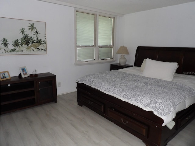 2617 Cove Cay Dr Unit 707, Clearwater, FL 33760 - bedroom featuring light wood finished floors