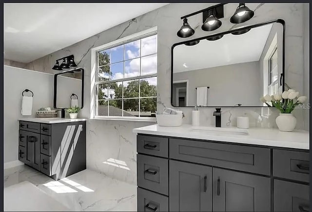 19003 Cedar Ln, Lutz, FL 33548 - bathroom with marble tiled floors and vanity