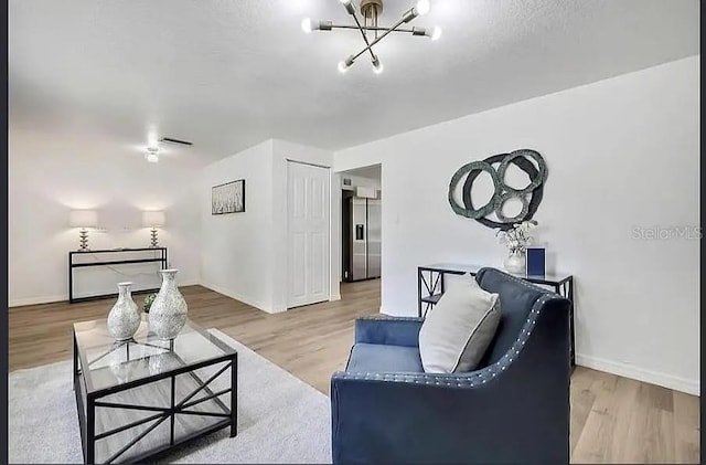 19003 Cedar Ln, Lutz, FL 33548 - living area with a chandelier and wood finished floors