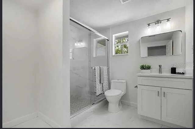 19003 Cedar Ln, Lutz, FL 33548 - full bathroom featuring a shower stall, vanity, and marble look tile flooring