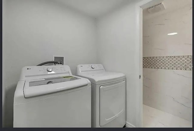 19003 Cedar Ln, Lutz, FL 33548 - washroom featuring washing machine and dryer