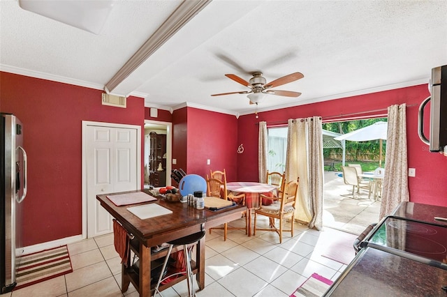 14803 Tulip Dr, Tampa, FL 33613 - dining space with ornamental molding, ceiling fan, light tile patterned floors, and a textured ceiling