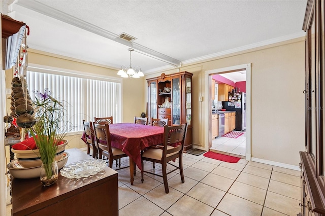 14803 Tulip Dr, Tampa, FL 33613 - dining area featuring a chandelier, ornamental molding, light tile patterned floors, and a textured ceiling