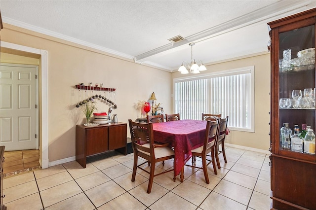 14803 Tulip Dr, Tampa, FL 33613 - dining room featuring ornamental molding, a chandelier, light tile patterned floors, and a textured ceiling