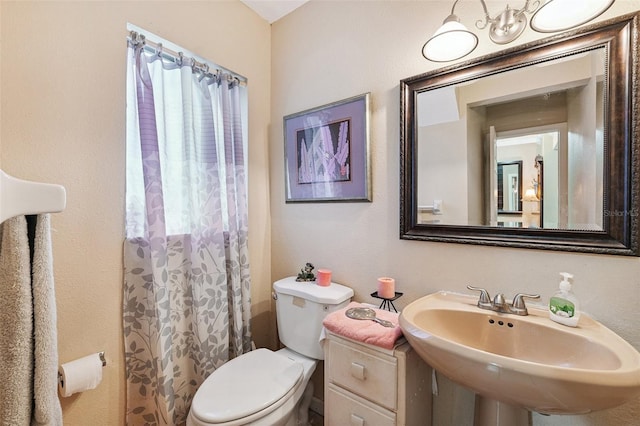 14803 Tulip Dr, Tampa, FL 33613 - full bath featuring a sink and a shower with shower curtain