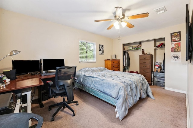 14803 Tulip Dr, Tampa, FL 33613 - carpeted bedroom featuring a closet, an office area, and ceiling fan