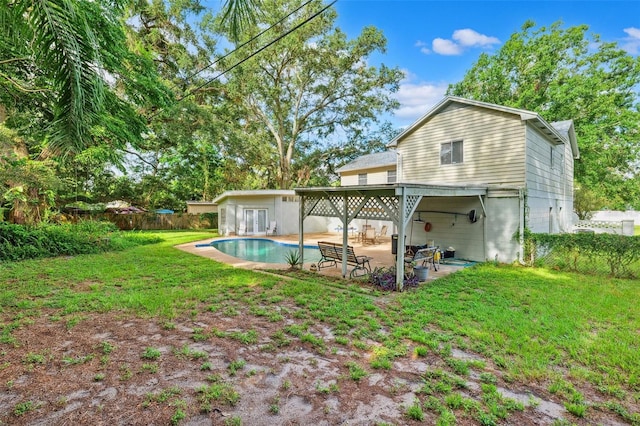 14803 Tulip Dr, Tampa, FL 33613 - back of property featuring a patio area and an outdoor pool
