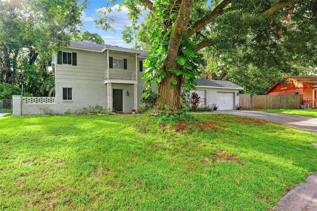 14803 Tulip Dr, Tampa, FL 33613 - traditional-style home with concrete driveway, a garage, and brick siding