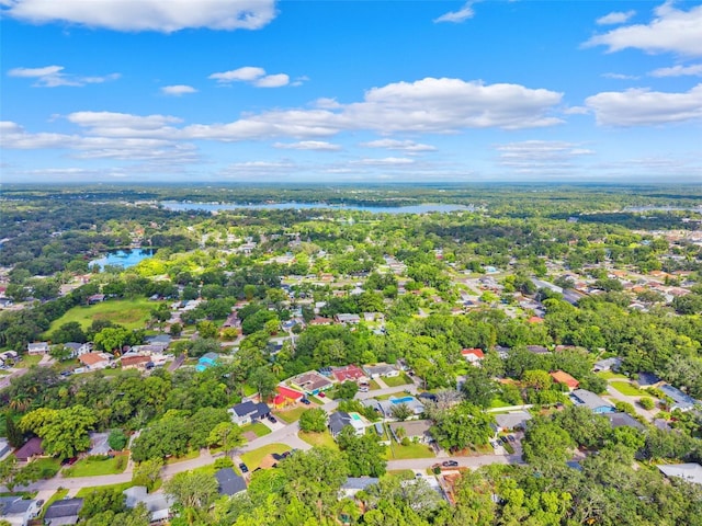 14803 Tulip Dr, Tampa, FL 33613 - aerial view of property and surrounding area featuring a large body of water and nearby suburban area