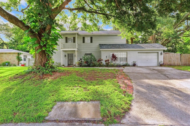 14803 Tulip Dr, Tampa, FL 33613 - traditional-style house with brick siding, a garage, and concrete driveway
