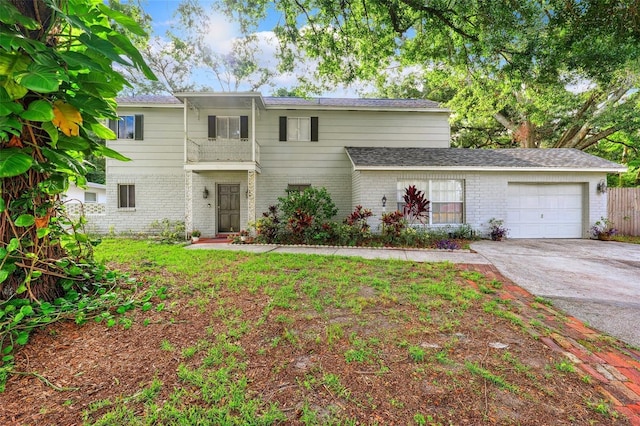 14803 Tulip Dr, Tampa, FL 33613 - view of front of home featuring brick siding, a garage, and driveway