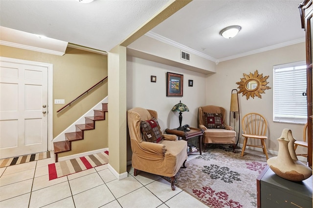 14803 Tulip Dr, Tampa, FL 33613 - sitting room with crown molding, light tile patterned floors, stairway, and a textured ceiling