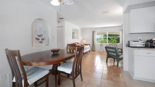 2807 Miriam St S, Gulfport, FL 33711 - dining room featuring ceiling fan and light tile patterned flooring