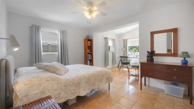 2807 Miriam St S, Gulfport, FL 33711 - bedroom featuring light tile patterned floors, vaulted ceiling, and a ceiling fan