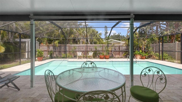 2807 Miriam St S, Gulfport, FL 33711 - view of swimming pool with a fenced backyard, a lanai, and a patio