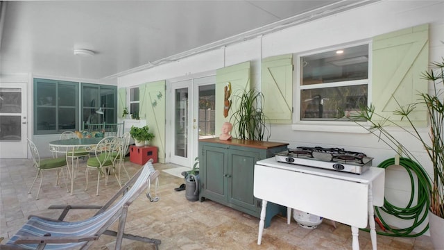 2807 Miriam St S, Gulfport, FL 33711 - view of patio / terrace with outdoor dining space and french doors