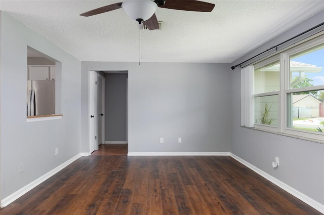 1806 11th St SW, Largo, FL 33778 - empty room with a ceiling fan, a textured ceiling, and wood finished floors