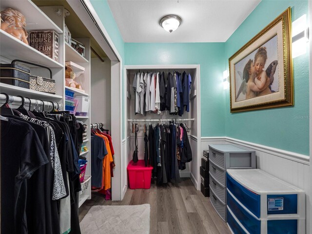 3944 49th Ave S, Saint Petersburg, FL 33711 - walk in closet featuring wood finished floors