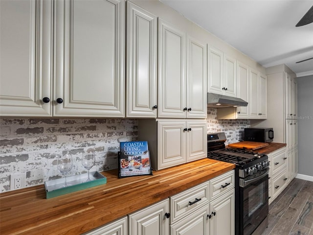 3944 49th Ave S, Saint Petersburg, FL 33711 - kitchen featuring butcher block counters, gas range, black microwave, under cabinet range hood, and dark wood-style flooring