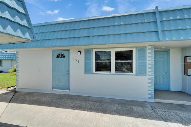 302 Andover Pl Unit G156, Sun City Center, FL 33573 - property entrance featuring mansard roof