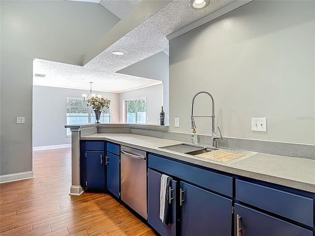 6001 Lemon Tree Ct, Tampa, FL 33625 - kitchen featuring blue cabinetry, dishwasher, a textured ceiling, light countertops, and a chandelier