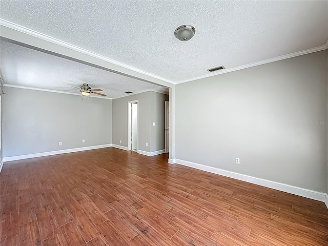 6001 Lemon Tree Ct, Tampa, FL 33625 - unfurnished room with a ceiling fan, wood finished floors, a textured ceiling, and crown molding
