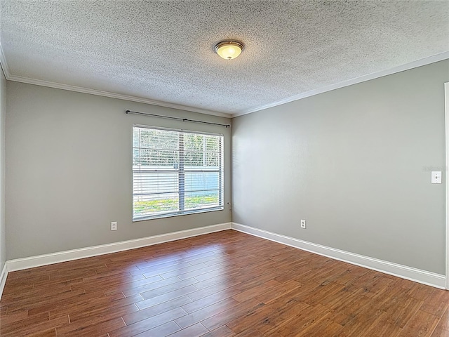 6001 Lemon Tree Ct, Tampa, FL 33625 - spare room with wood finished floors, ornamental molding, and a textured ceiling