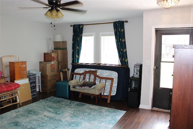 2101 Sunset Point Rd Unit 2304, Clearwater, FL 33765 - bedroom featuring wood-type flooring and a ceiling fan