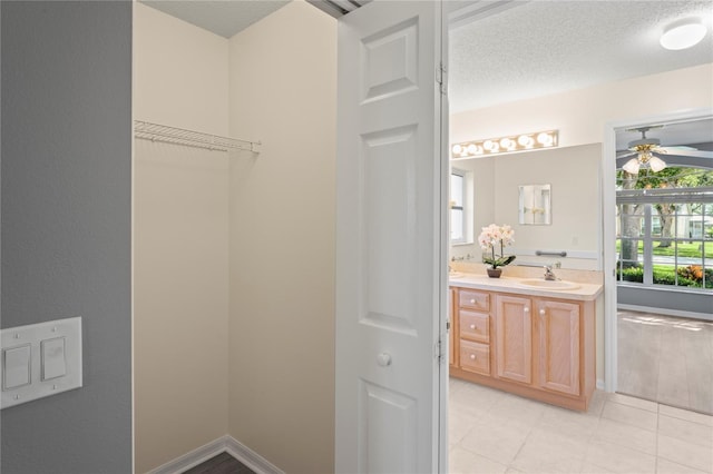 11412 Alden Ct, Hudson, FL 34667 - spacious closet with ceiling fan and light tile patterned floors
