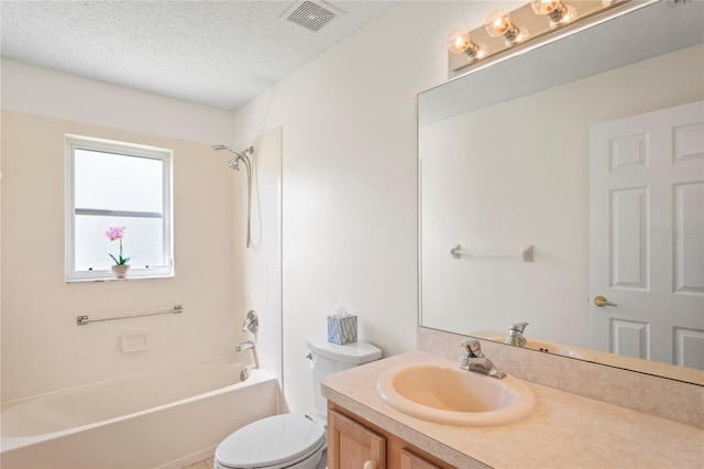 11412 Alden Ct, Hudson, FL 34667 - bathroom featuring vanity, shower / tub combination, and a textured ceiling