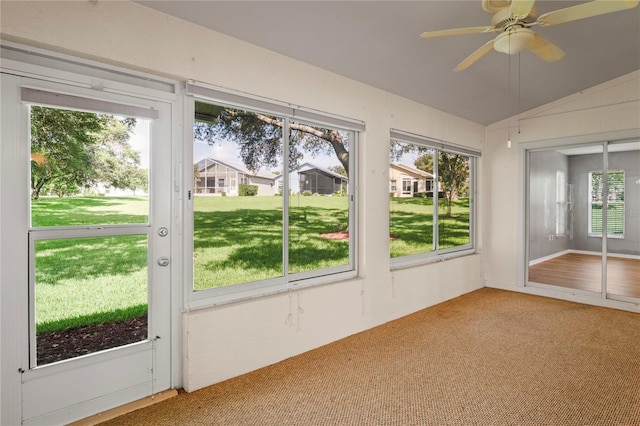 11412 Alden Ct, Hudson, FL 34667 - unfurnished sunroom featuring plenty of natural light and vaulted ceiling