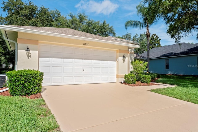 11412 Alden Ct, Hudson, FL 34667 - single story home featuring stucco siding, a garage, and concrete driveway