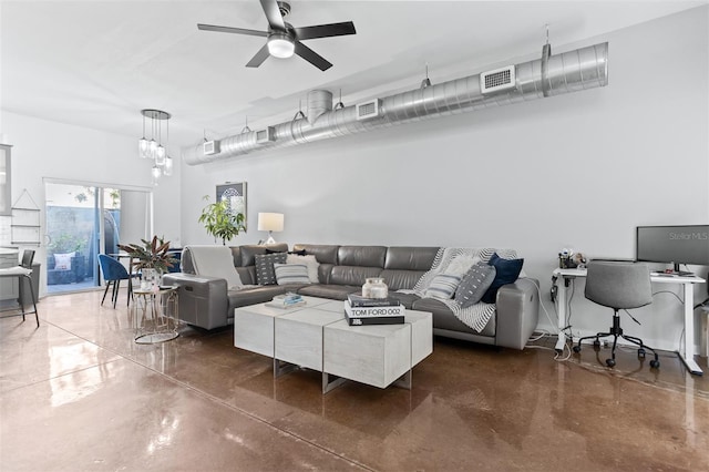 851 3rd Ave N, Saint Petersburg, FL 33701 - living room featuring finished concrete floors and a ceiling fan