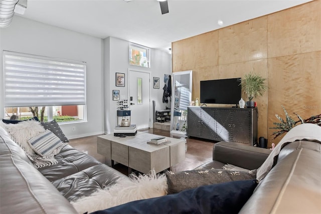 851 3rd Ave N, Saint Petersburg, FL 33701 - living area featuring a ceiling fan and baseboards
