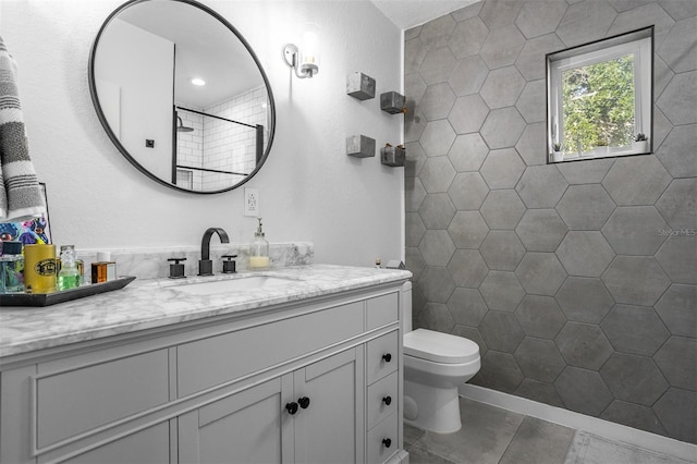 851 3rd Ave N, Saint Petersburg, FL 33701 - full bath with vanity, a tile shower, and tile patterned floors