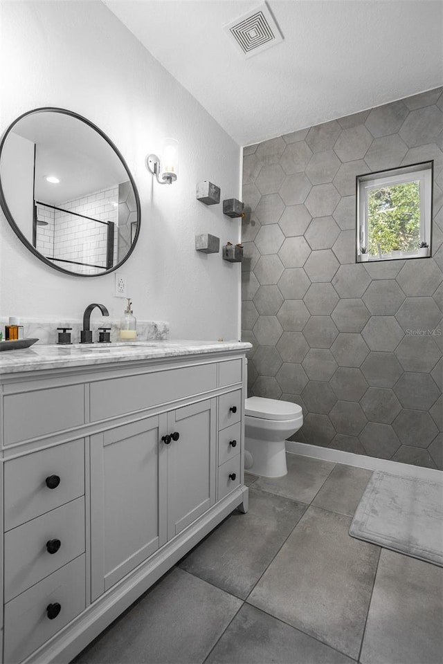 851 3rd Ave N, Saint Petersburg, FL 33701 - bathroom featuring vanity and tile patterned floors
